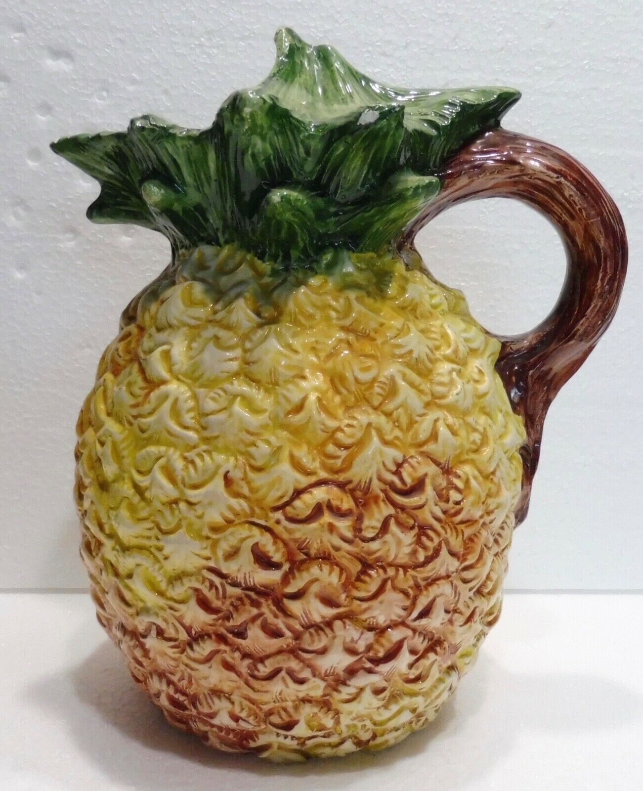 Pitcher on pineapple earthenware