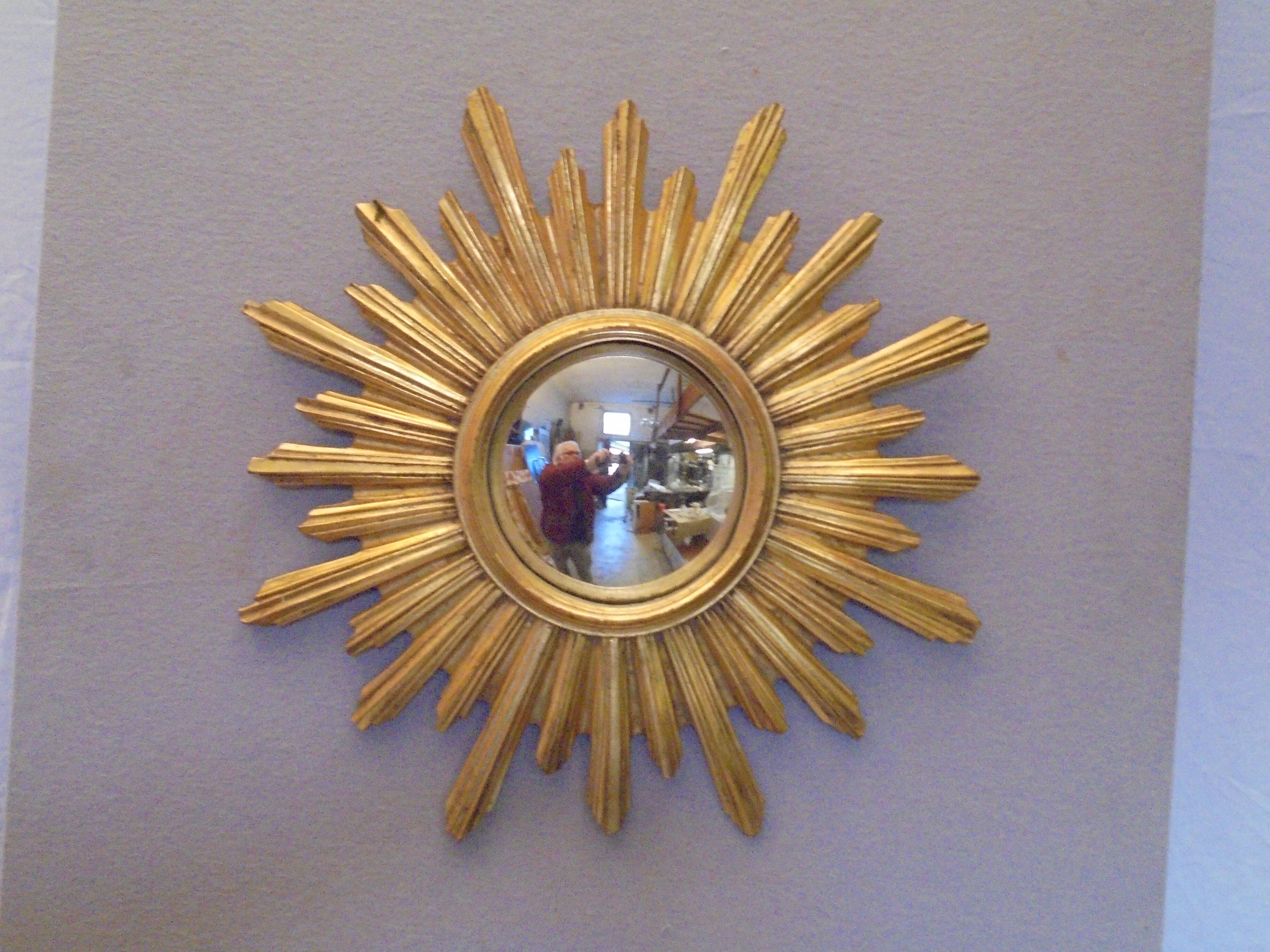 Sun mirror in golden resin from the 70s