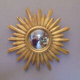 Sun mirror in golden resin from the 70s