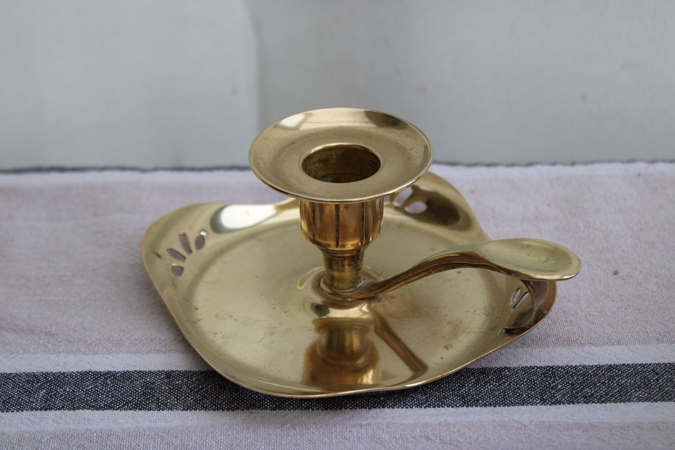 Golden brass candle holder