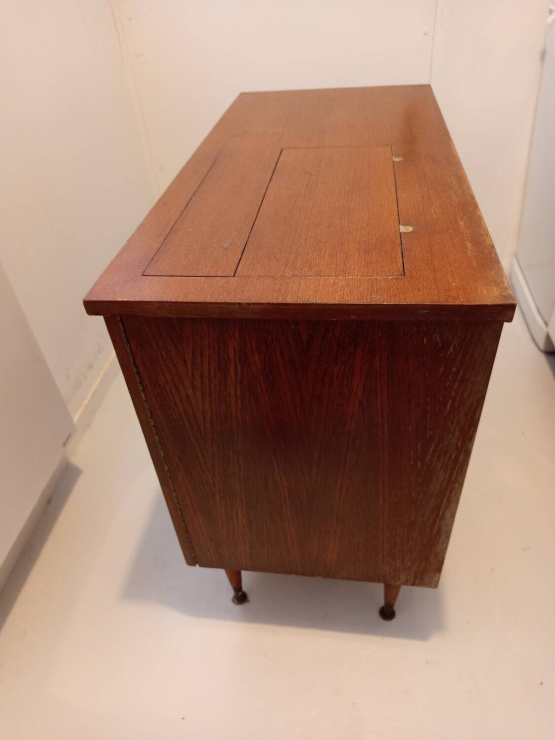 Antique sewing machine cabinet