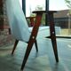Scandinavian boucle armchair in snow white with dark walnut wood colour, designed by Chierowski, model 366.