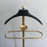 Neoclassical style valet stand in brass and black lacquered wood. French work. Circa 1940