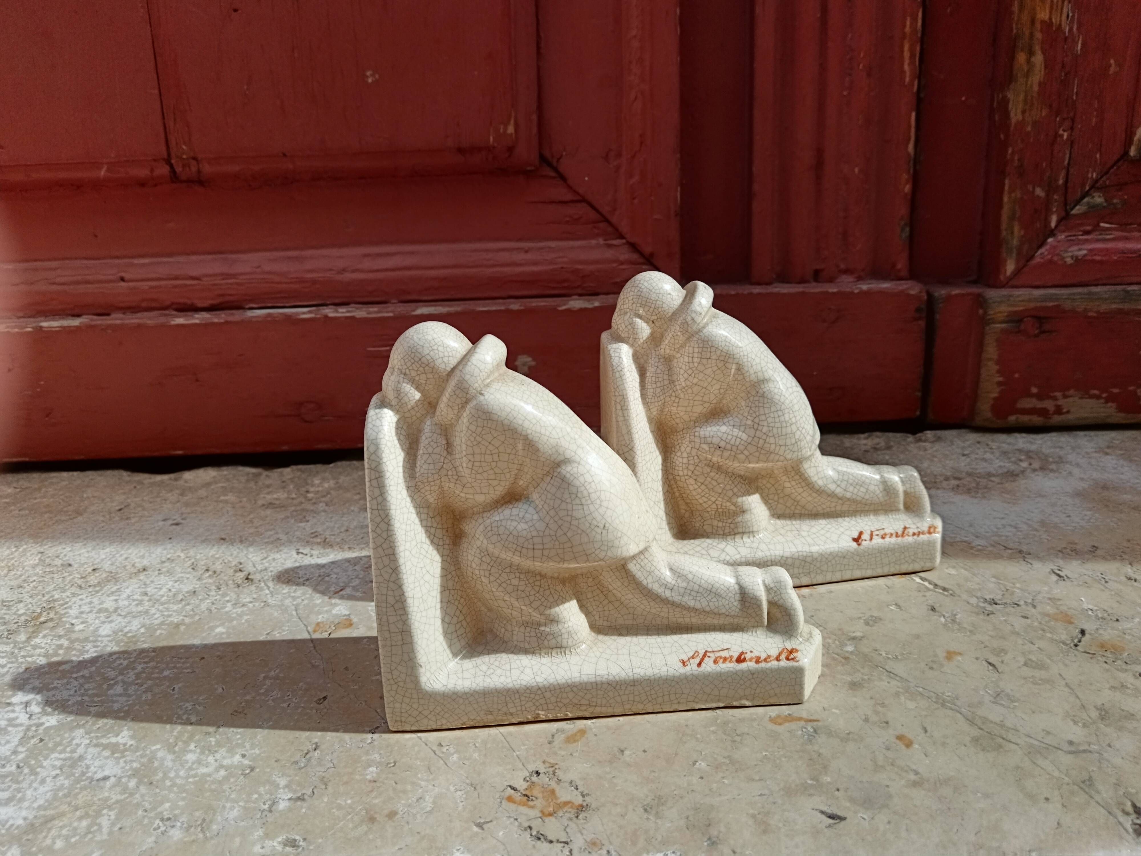 Pair of bookends - Ceramic - Signed L Fontinelle