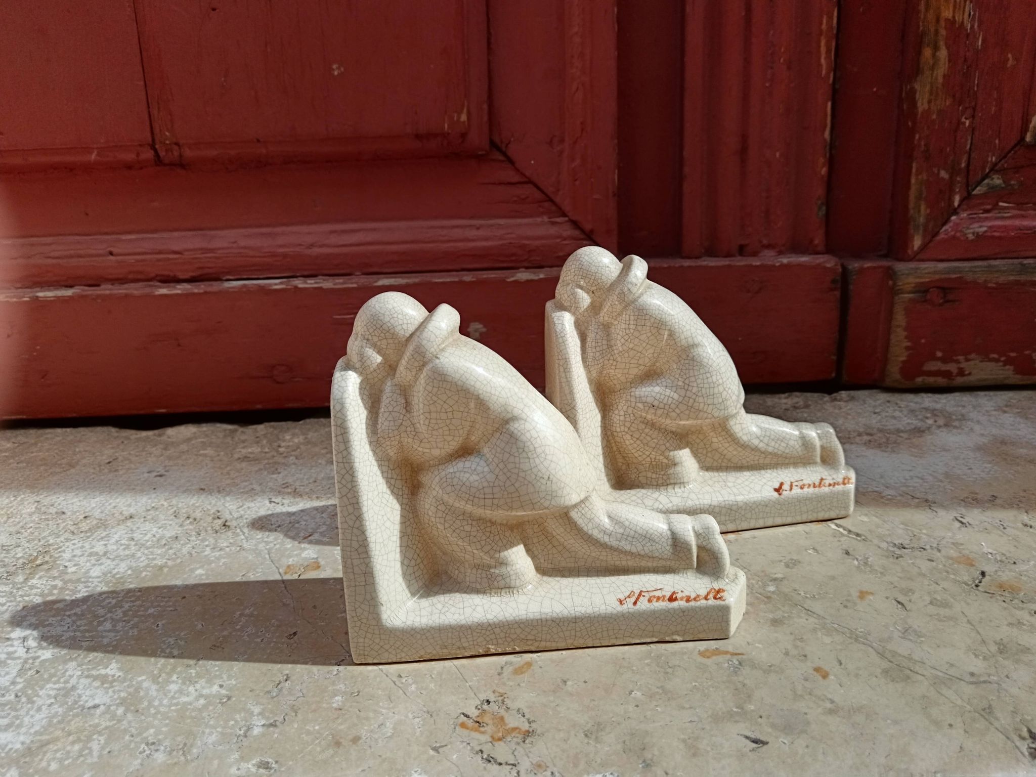 Pair of bookends - Ceramic - Signed L Fontinelle