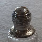 Crystal and solid silver shaker, neck brace and master's mark.
