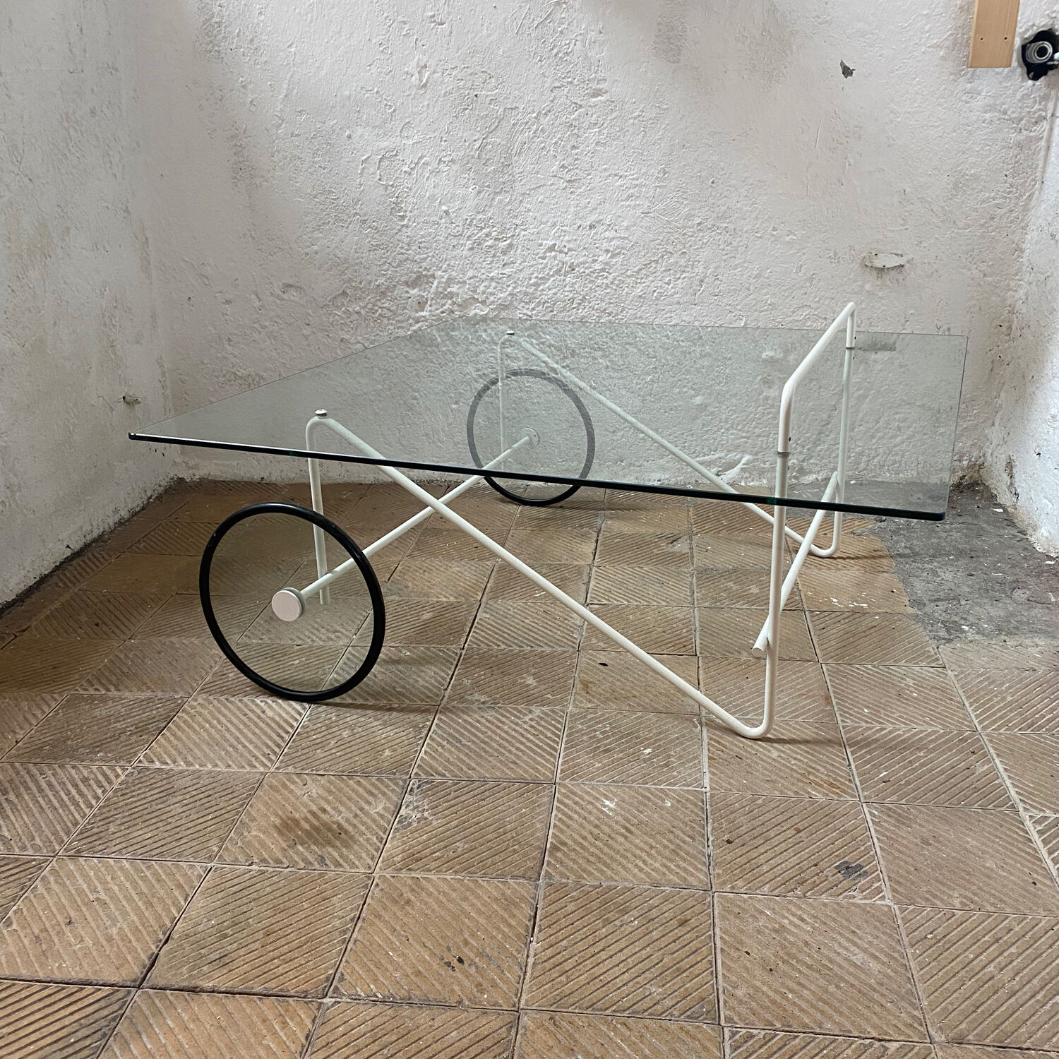 Italian glass coffee table with castors