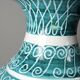 Vintage turquoise ceramic baluster vase with incised decoration.