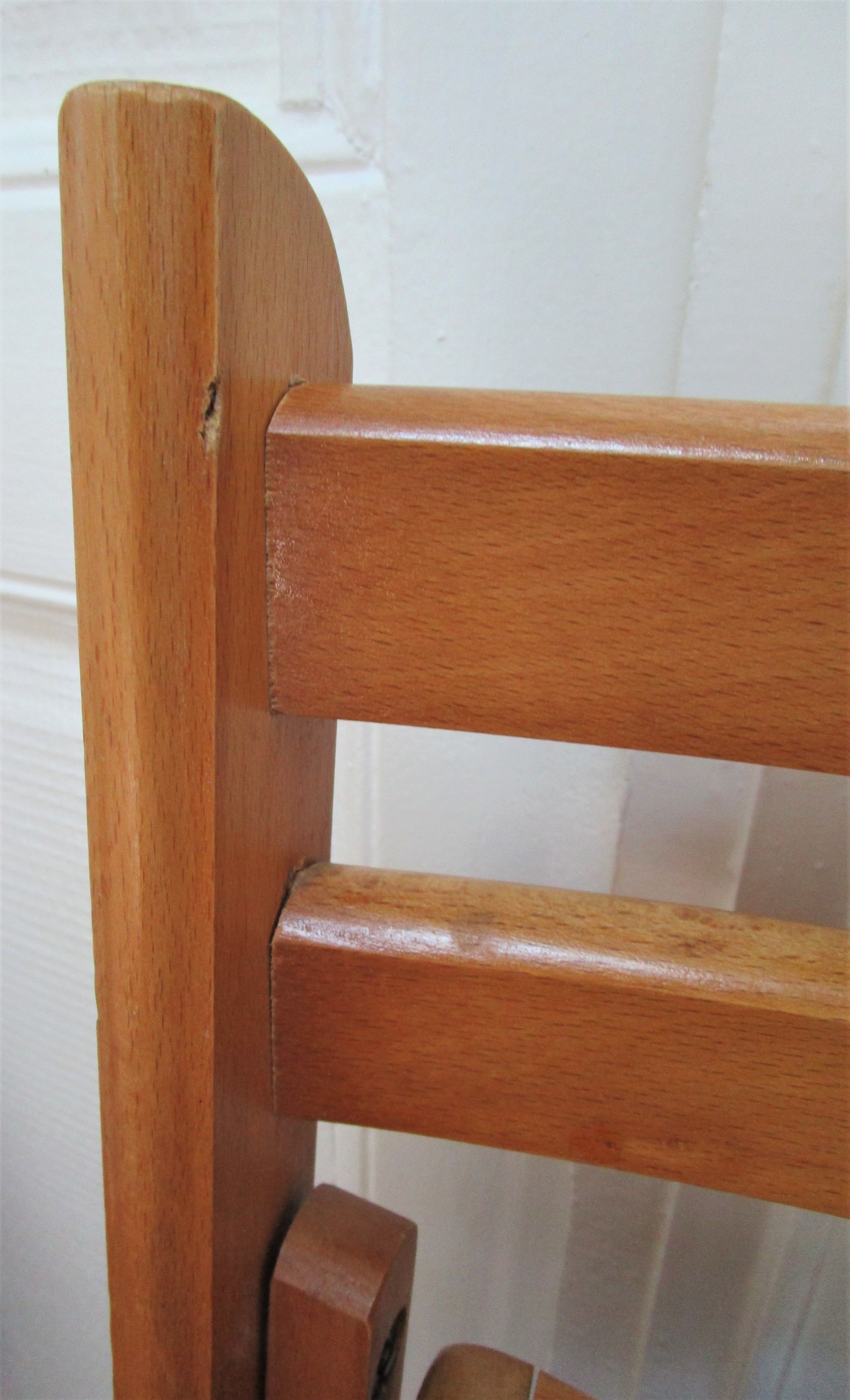 Pair of folding chairs with vintage solid wood slats