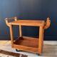 Vintage wooden trolley on wheels