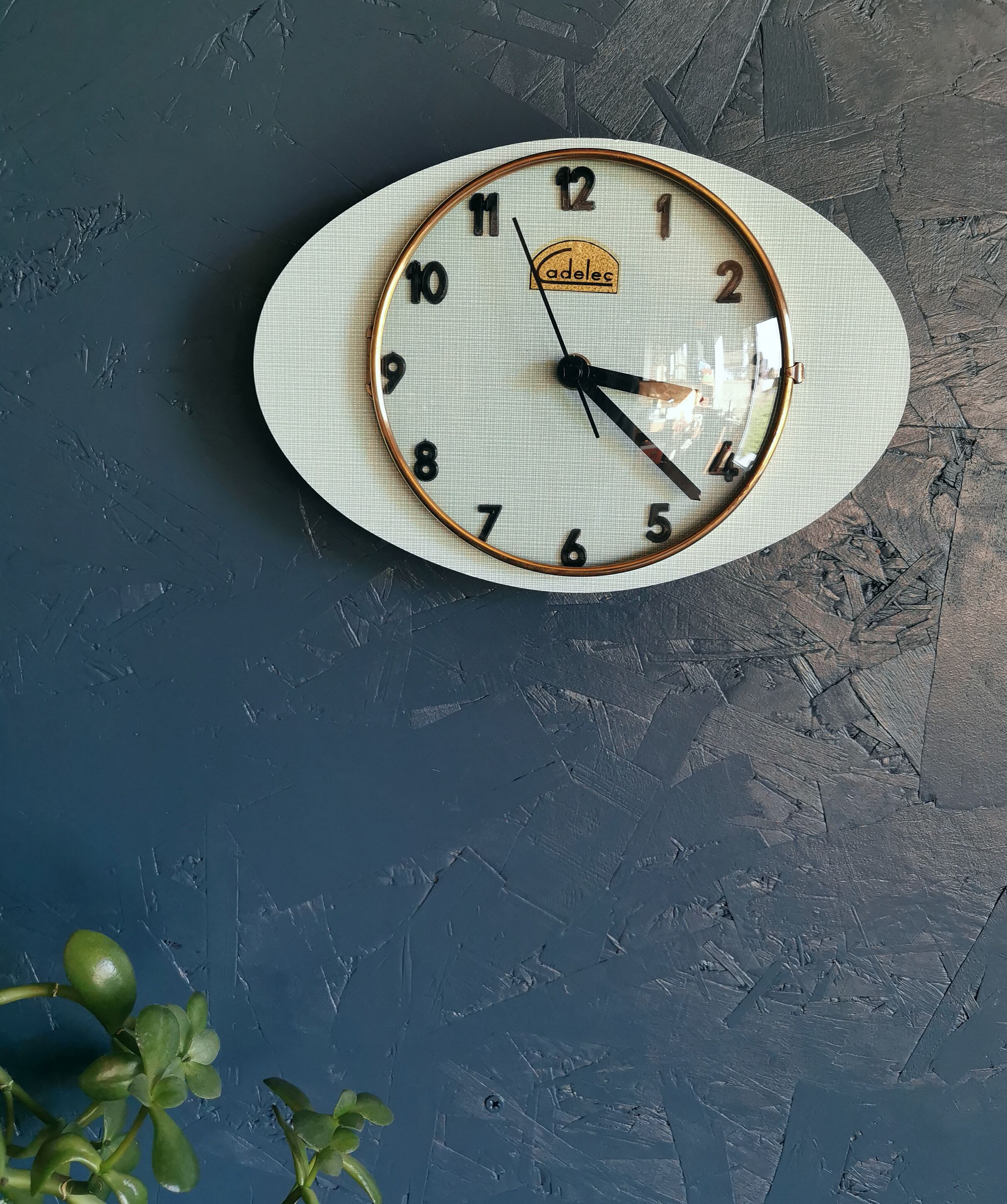 Vintage formica clock oval silent wall clock "Cadelec blue"