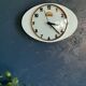 Horloge formica vintage pendule murale silencieuse ovale "Cadelec bleu"