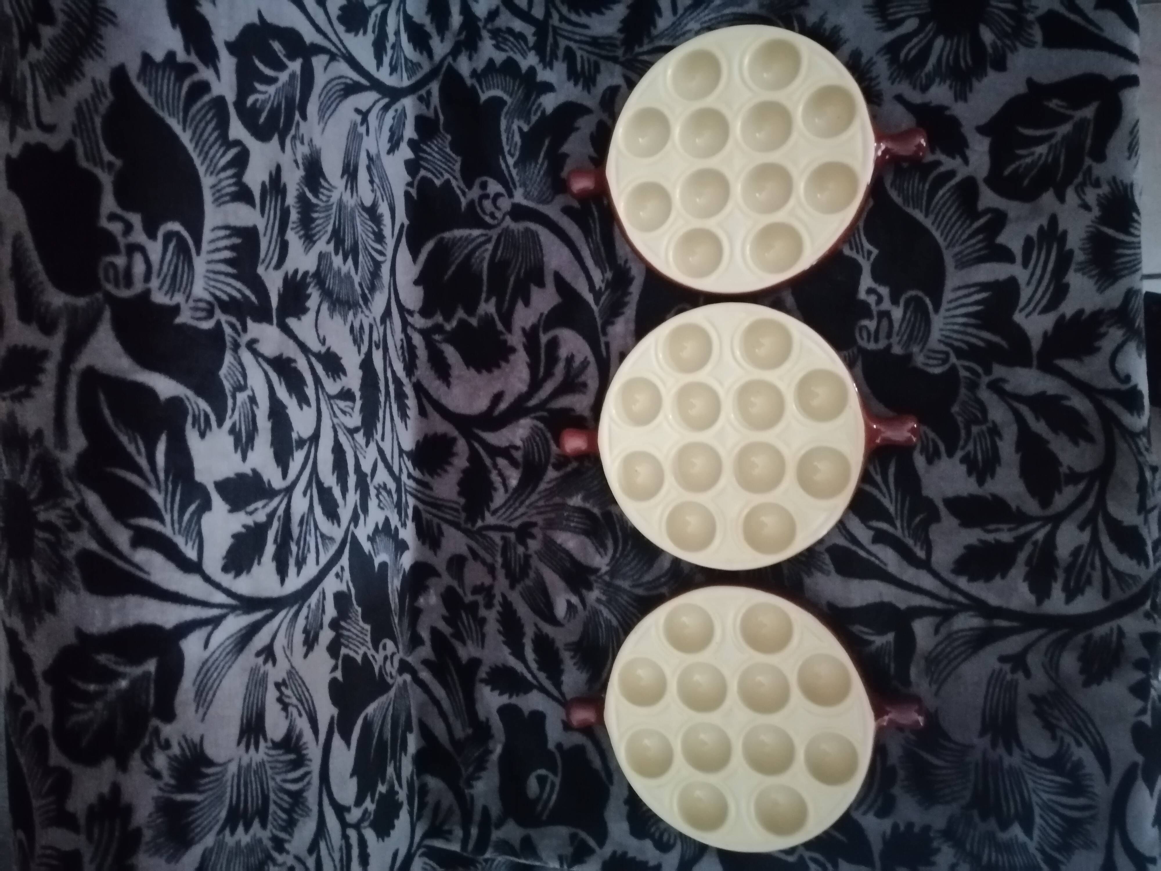 Set of three ceramic snail dishes