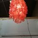 Suspension with pink mother-of-pearl tablets