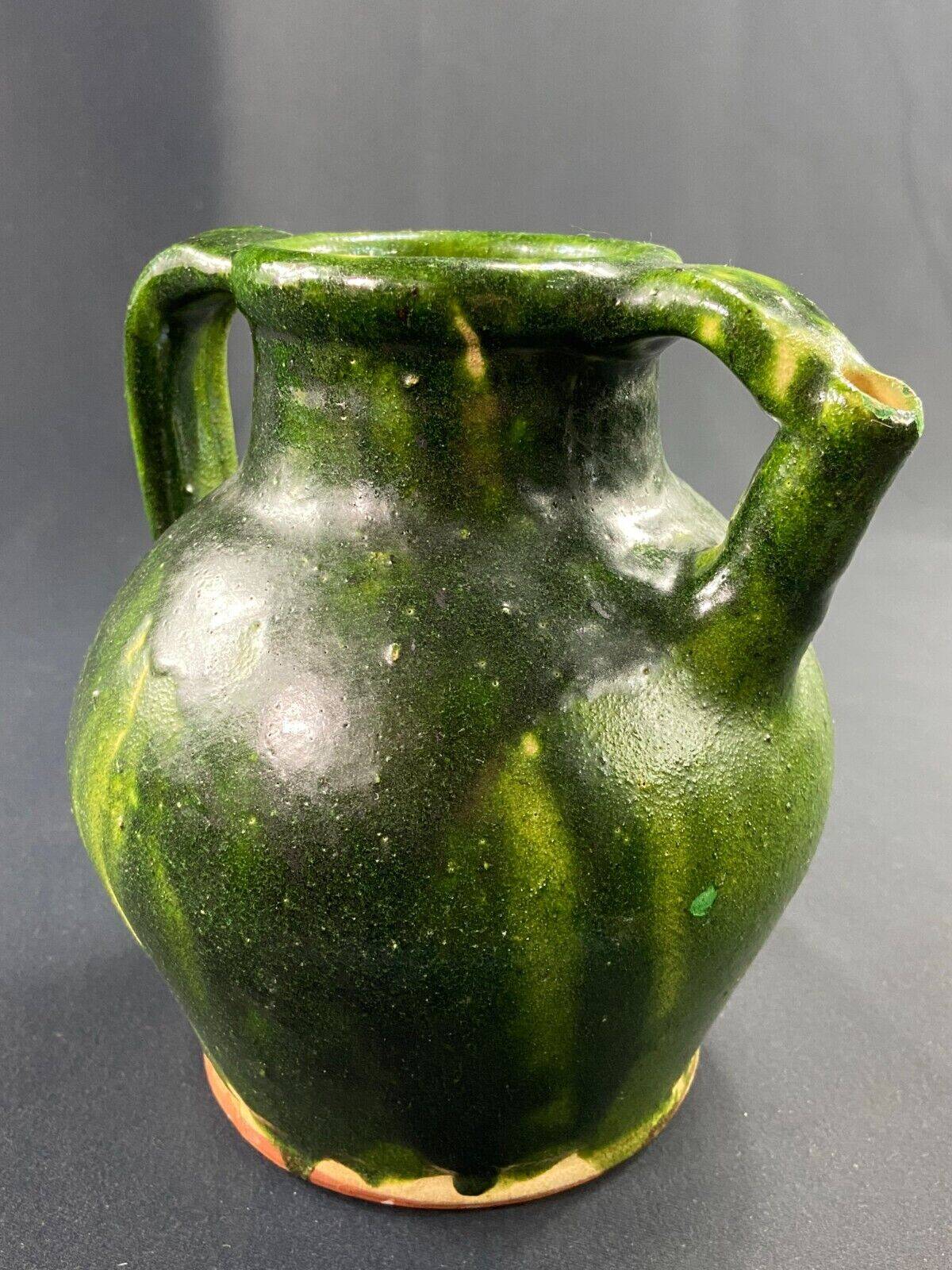 19th century green enamelled stoneware jug