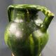 19th century green enamelled stoneware jug