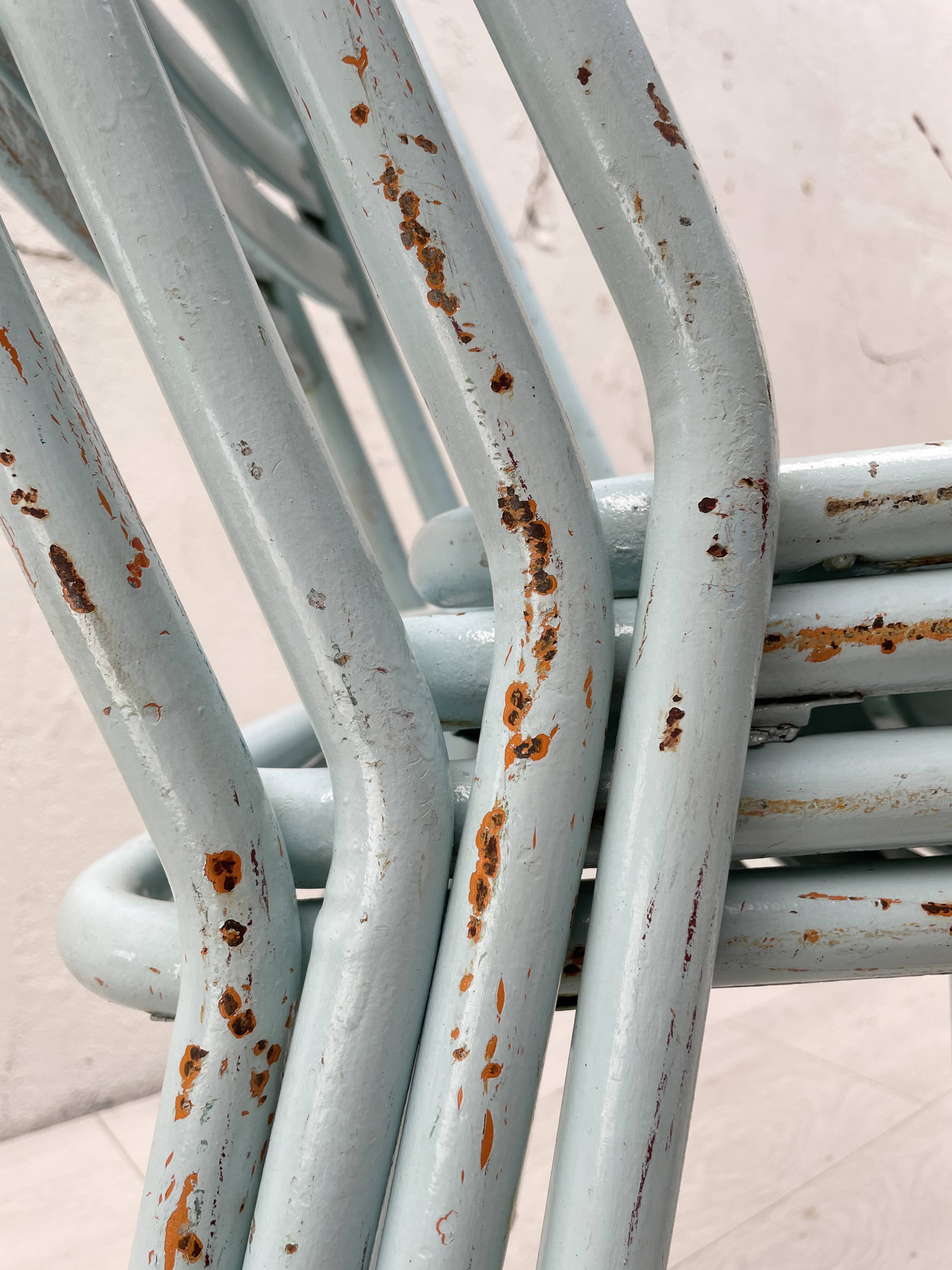 Set of four Tolix T2 chairs, circa 1950.