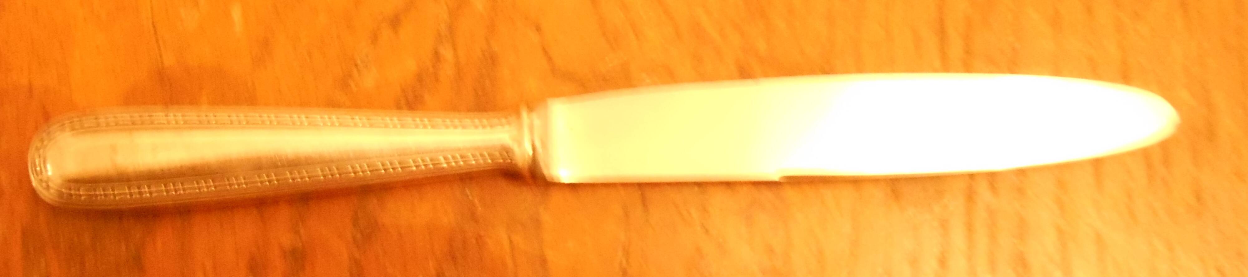 11 silver metal knives