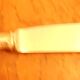 11 silver metal knives