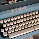 Blue typewriter Ollivetti Studiu 46 years 70