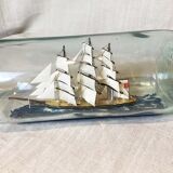 Model boat in glass bottle, 32 cm