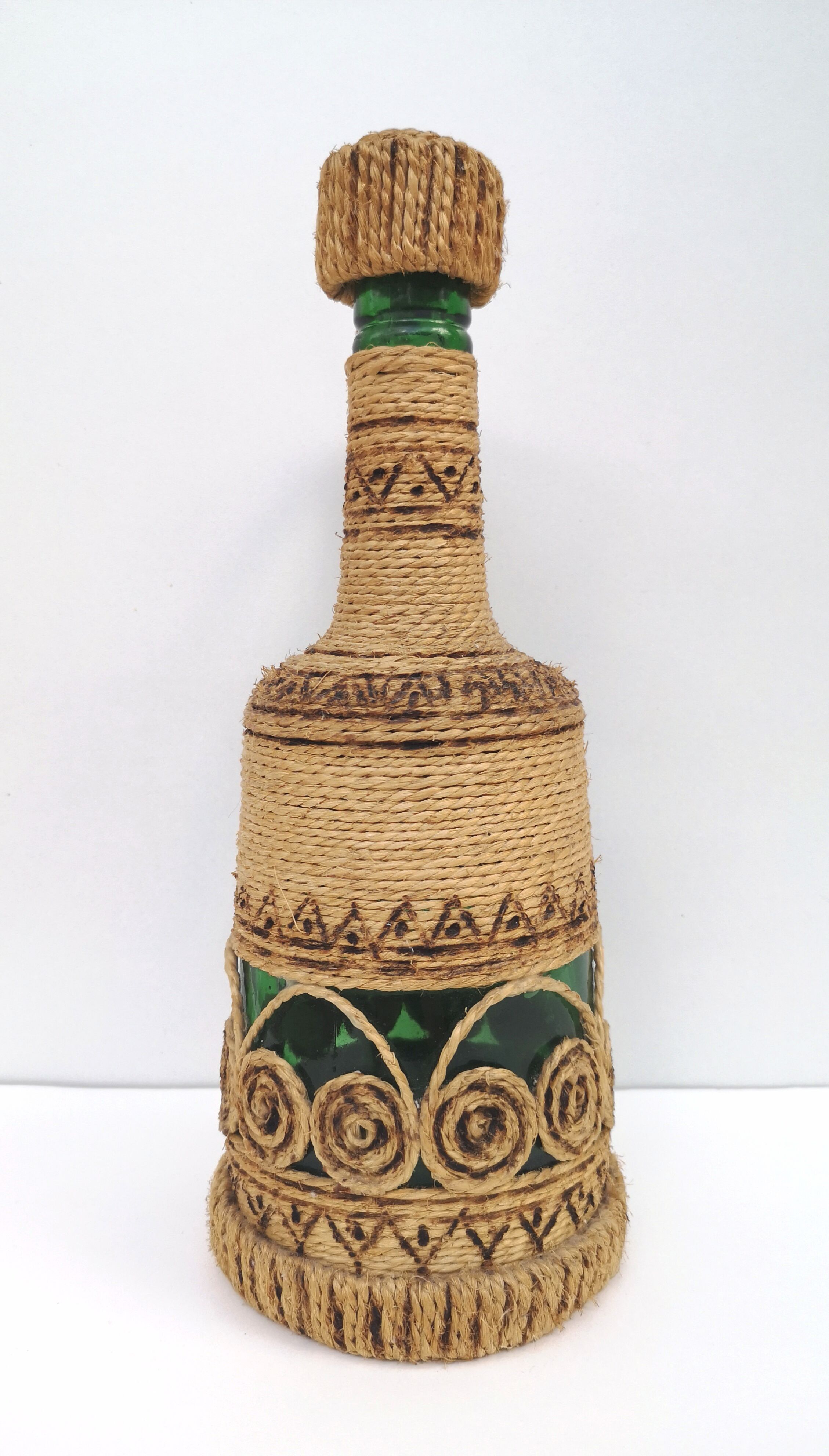 Vintage decorative rope bottle
