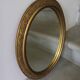 Oval gold mirror in Napoléon III style