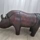 Leather rhinoceros footrest by Valenti, circa 1975.