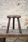 Vintage wooden tripod stool, mountain work, wabi-sabi, shepherd.