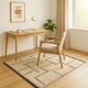 Beige Berber rug with structured lines.