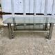 Table basse tubes chrome et verres fumés 1970
