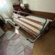 Vintage convertible wooden and cane sofa