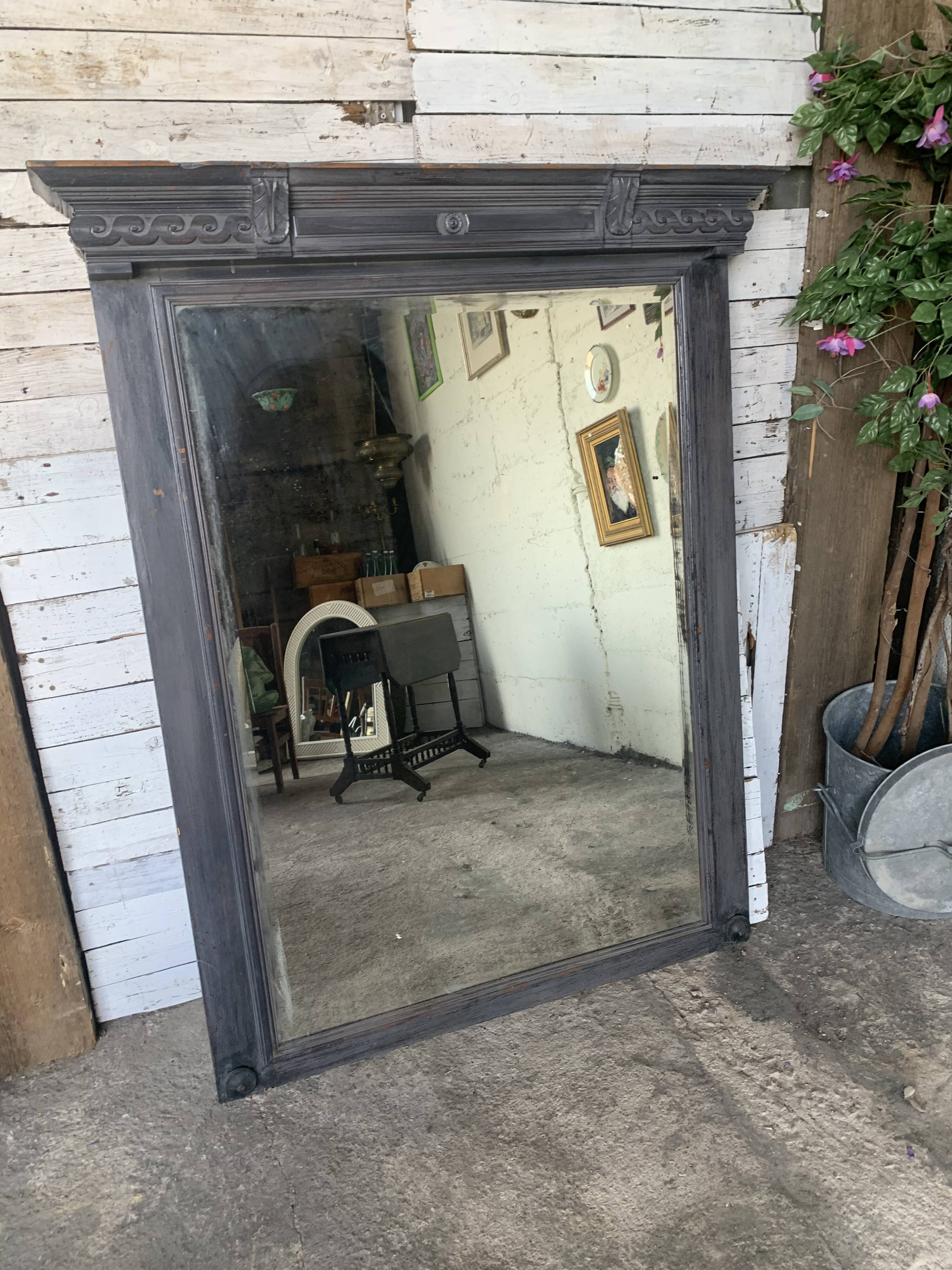 Wooden mirror with juice patina