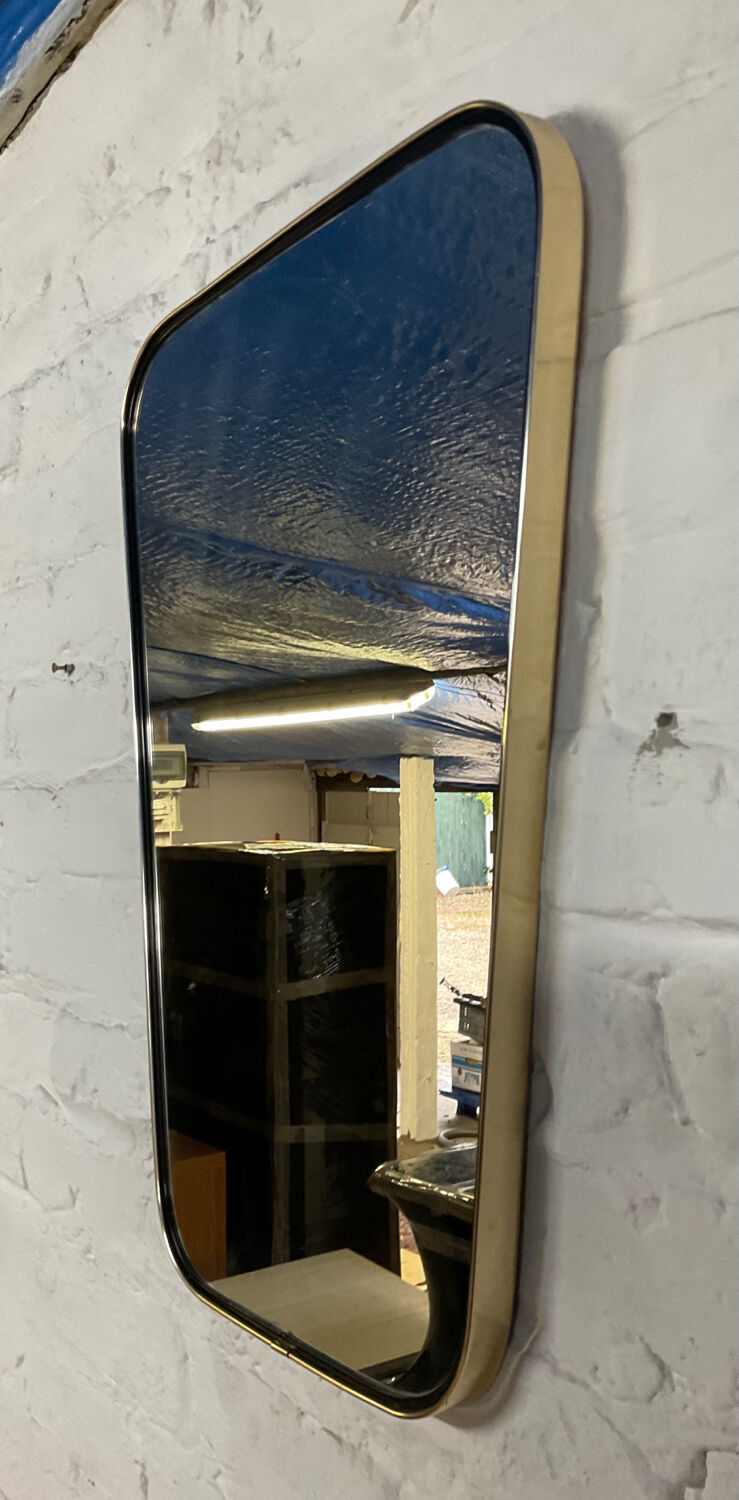 Asymmetrical free-form mirror from the 60s