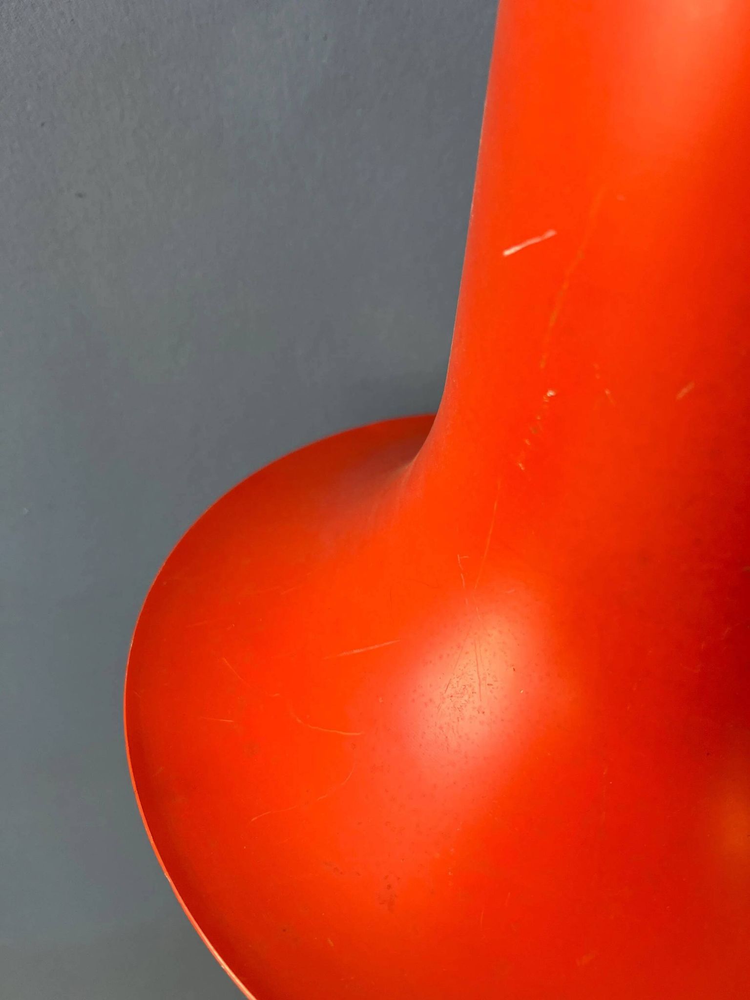 Vintage orange cone-shaped Raak suspension