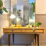 Dressing table in a vintage mirror triptych