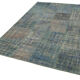 Hand-knotted oriental vintage 176 cm x 244 cm blue patchwork carpet