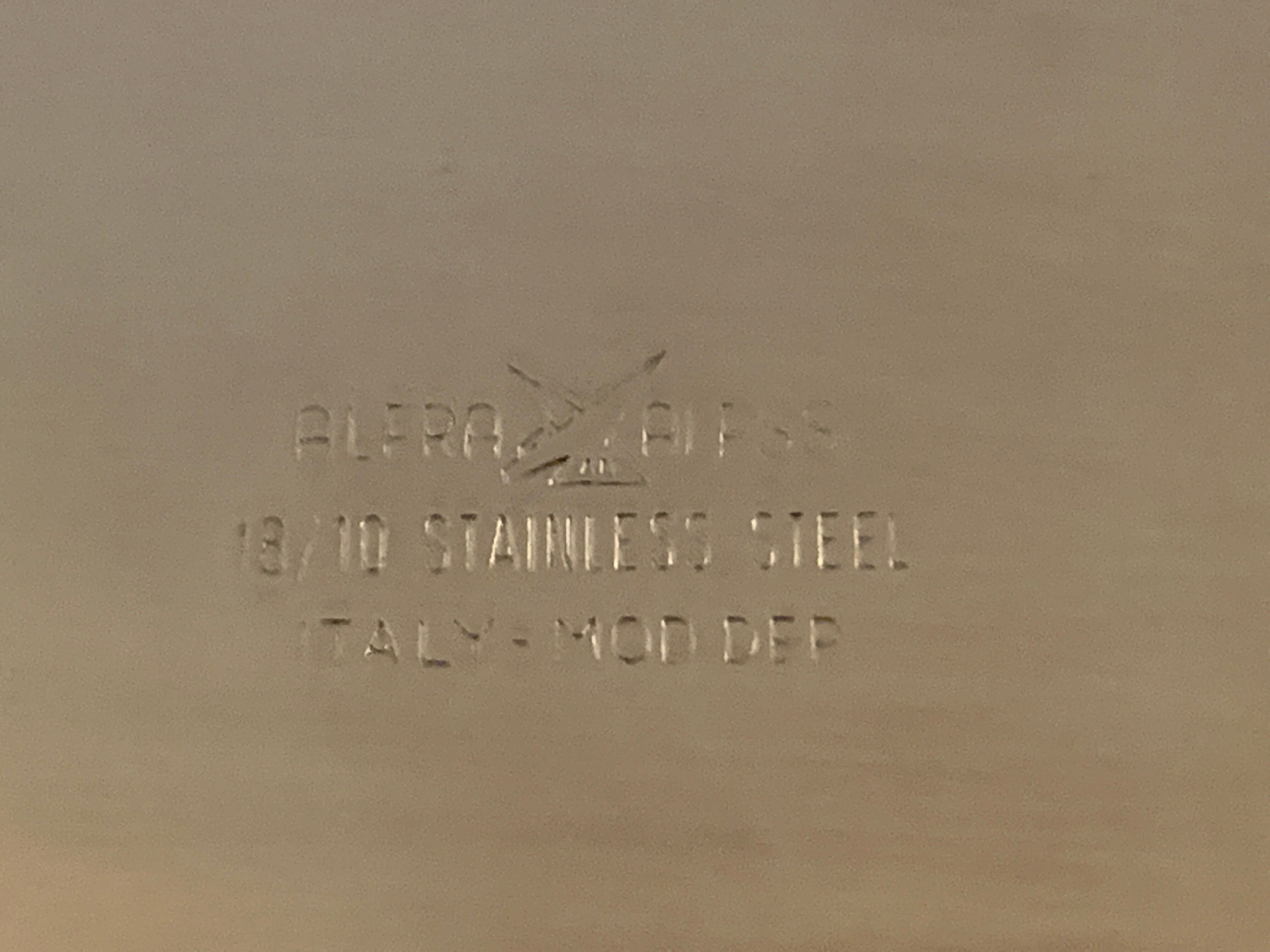 Italian salt and pepper shaker in stainless steel and Alessi glass, 1980