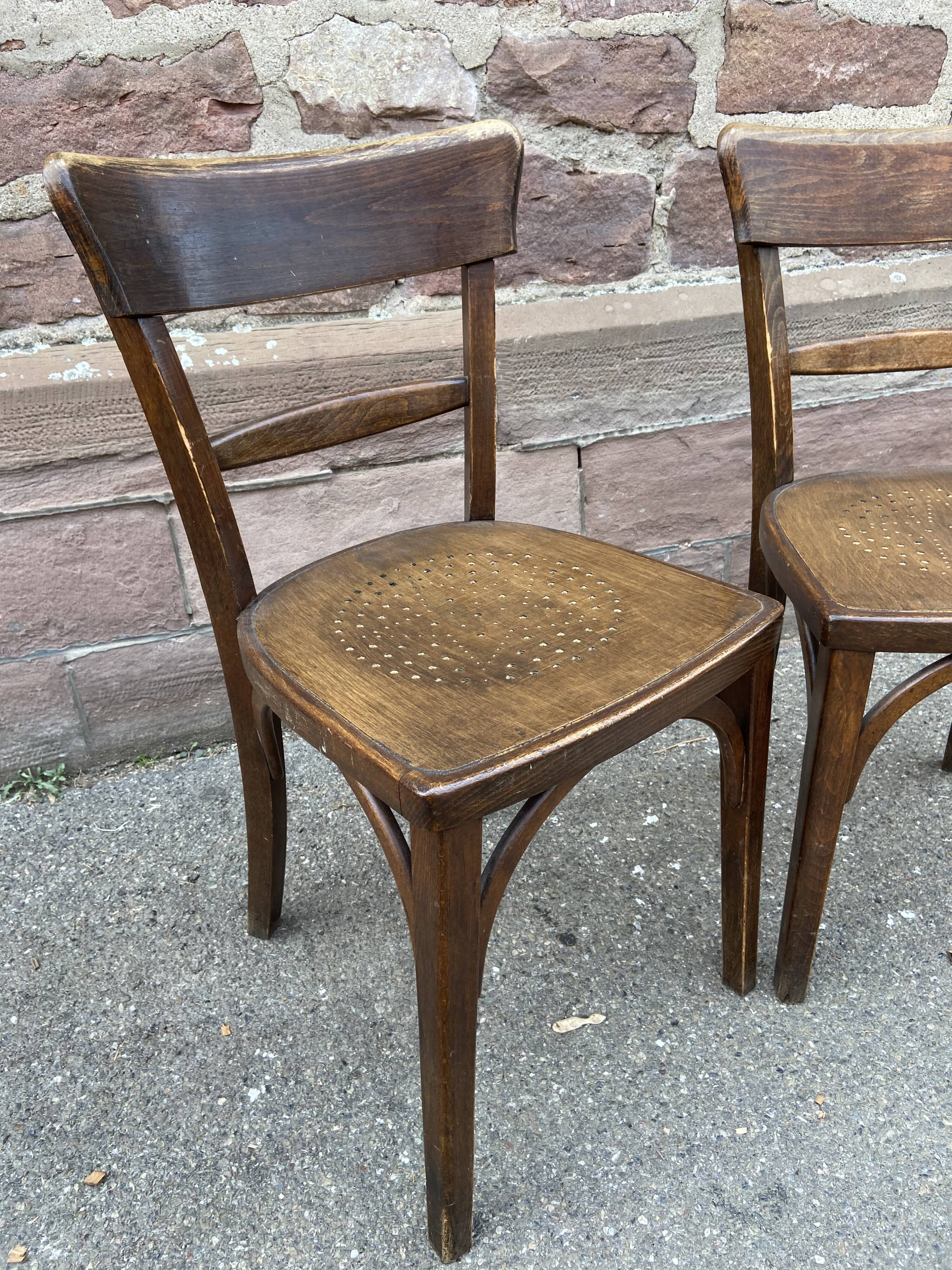 Pair of curved wooden brasserie chair
