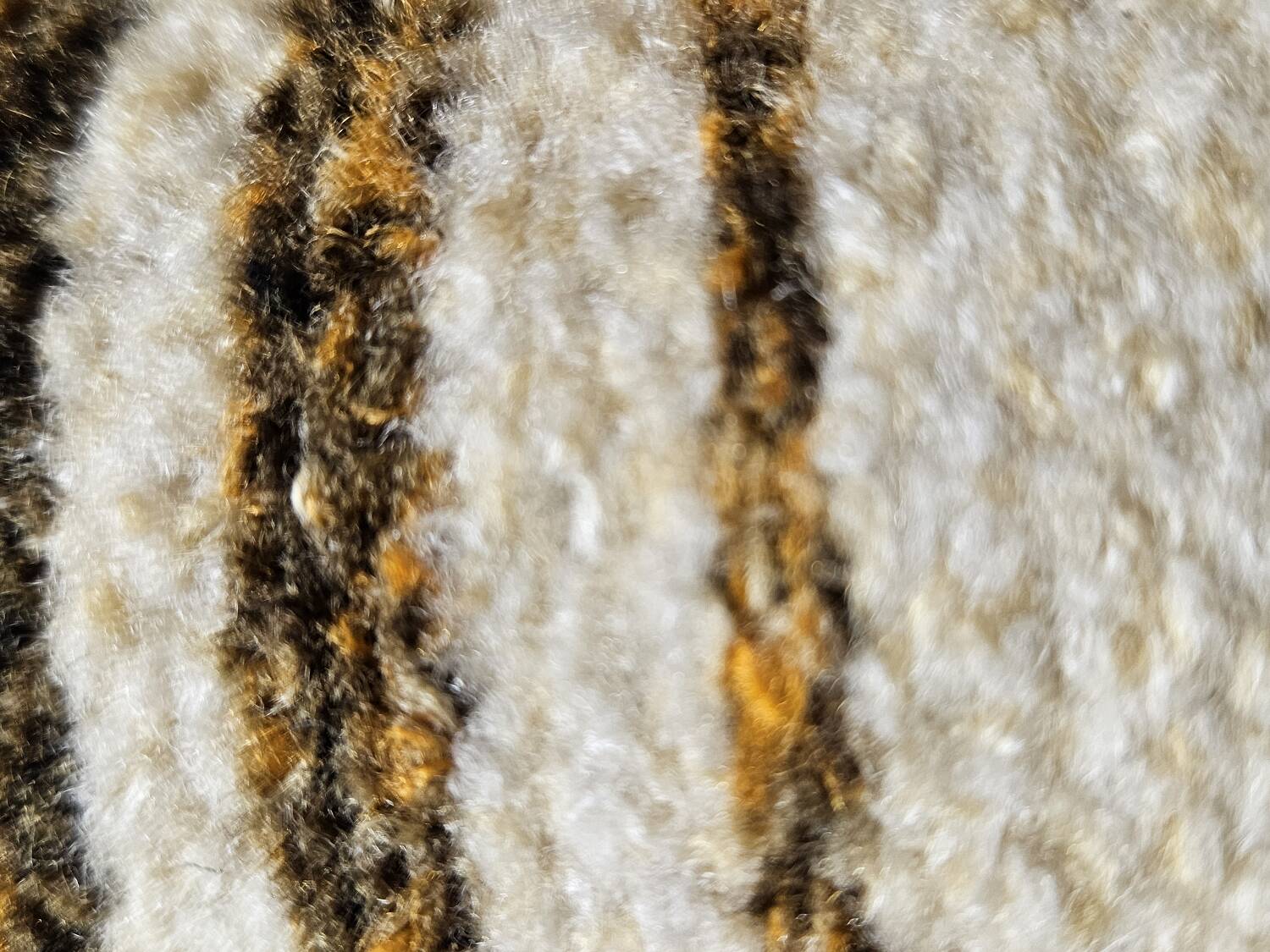 Boucle wool fireside chair and its 1970" vintage pouf