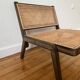 Vintage wooden and cane armchair