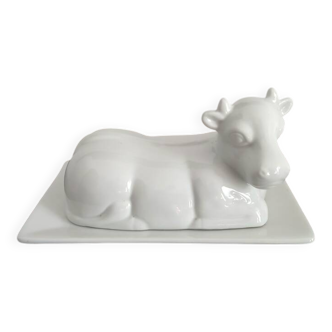 White porcelain cow-shaped butter dish