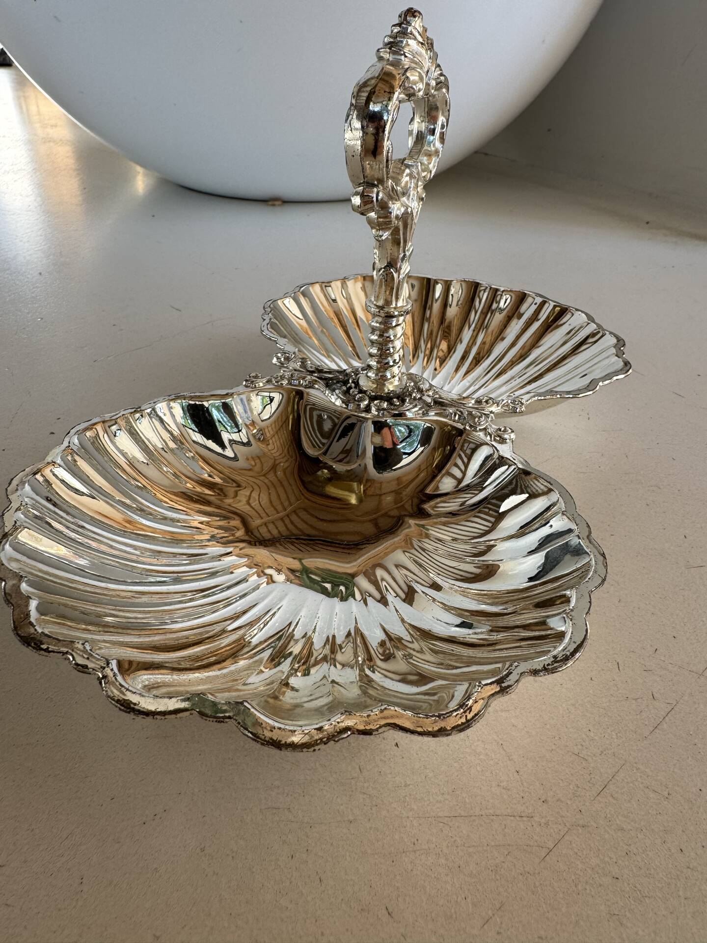 Vintage silver-plated shell display stand