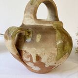 Small Provençal goat jug in creamy white and green enamelled stoneware