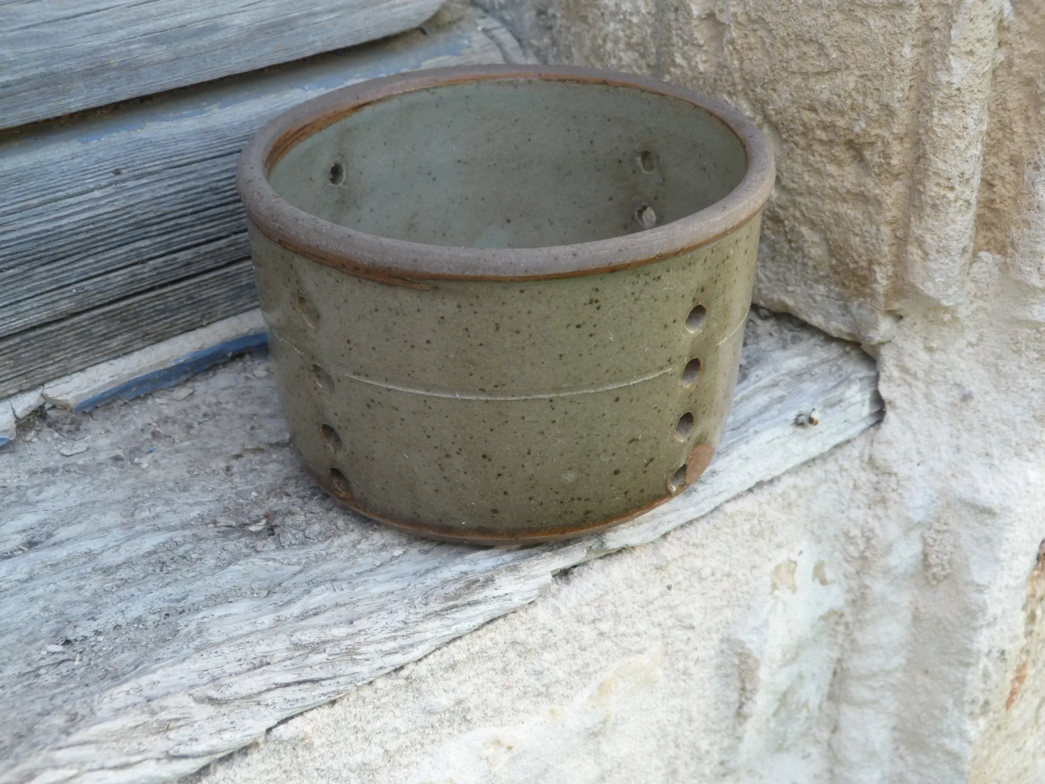 Old stoneware cheese drainer