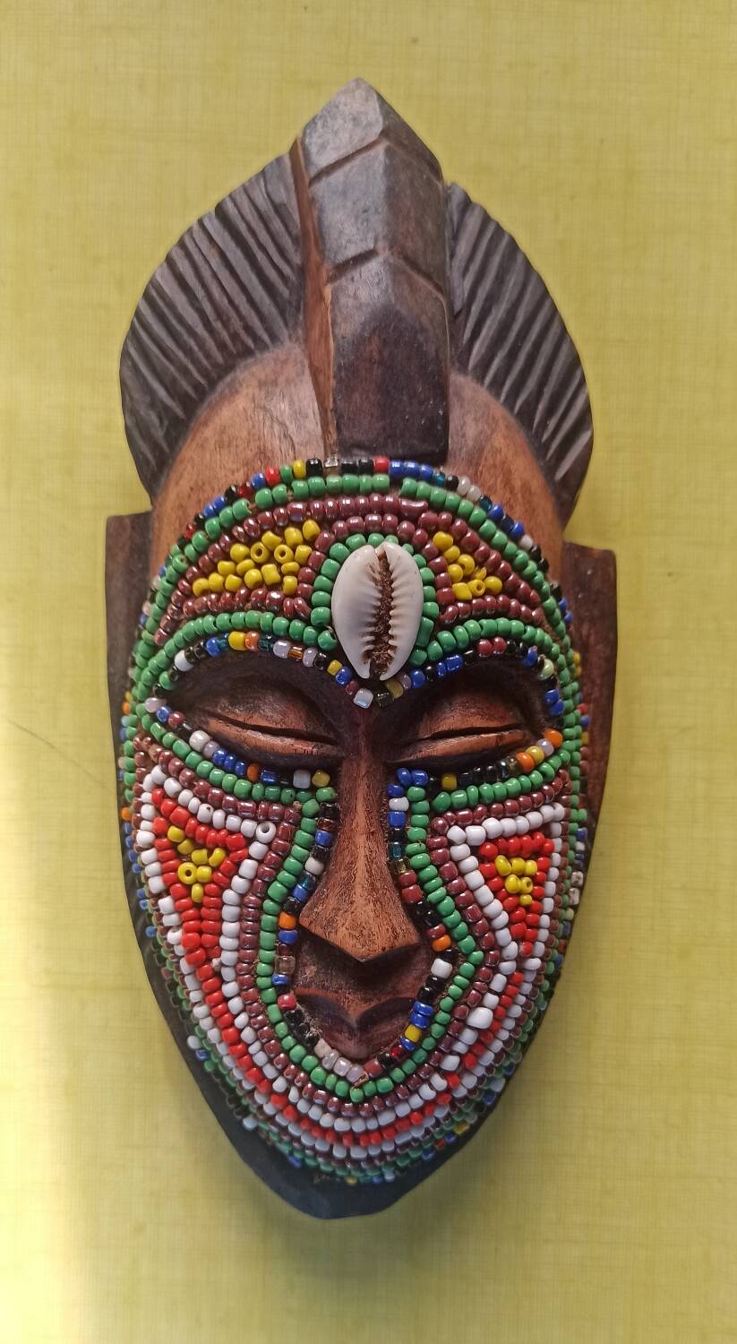 African mask with beads