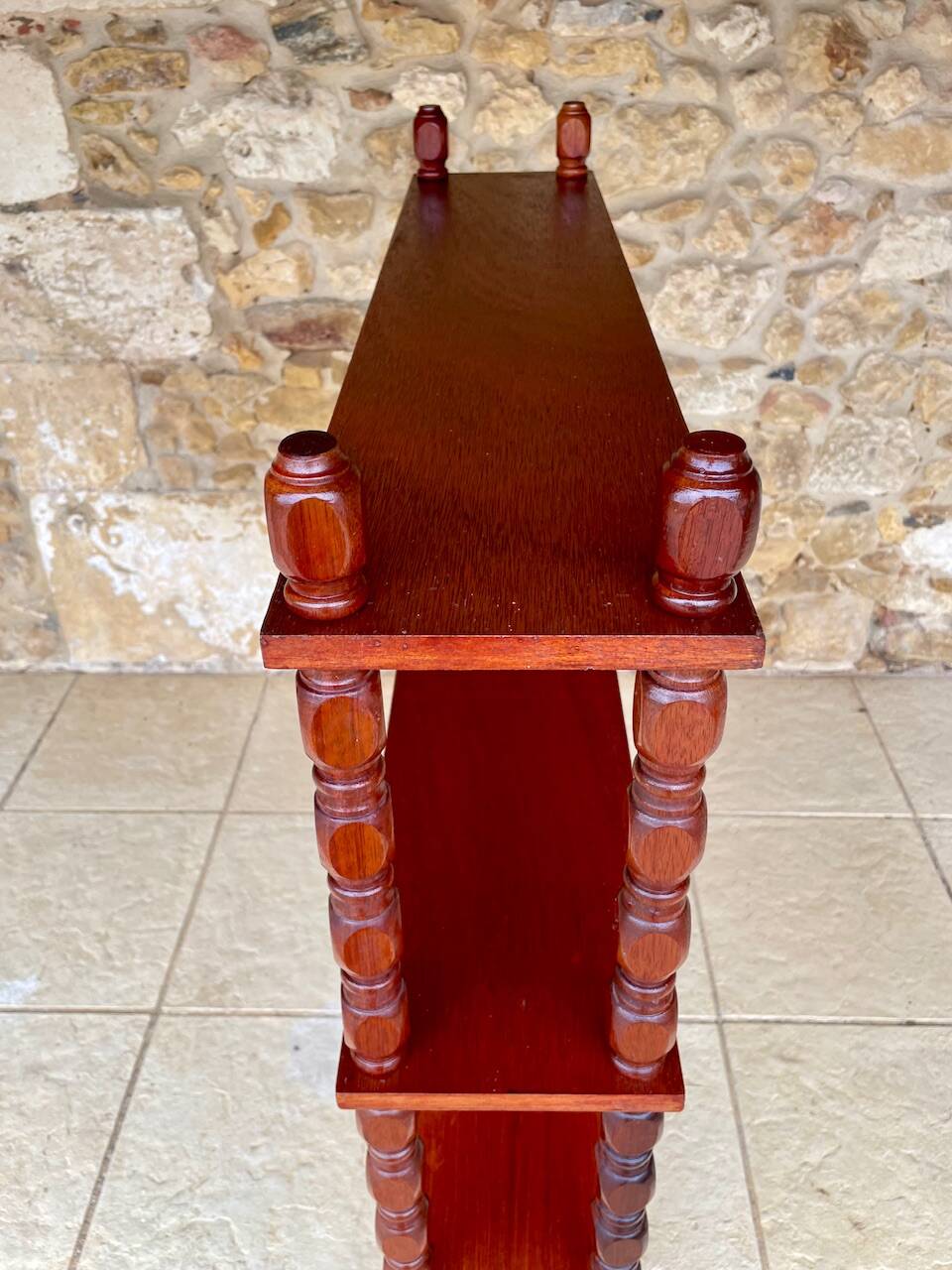 Vintage 5-tier turned wood shelf on legs.