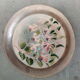 Duo of sub bouteilles or metal and ceramic coasters