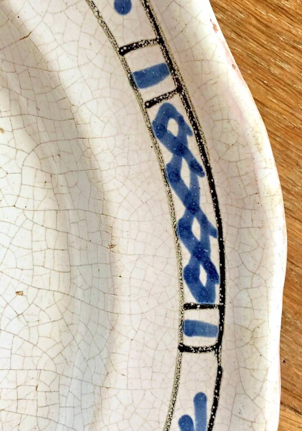 Old round hollow dish XVIII black bottom Rouen Forges les eaux