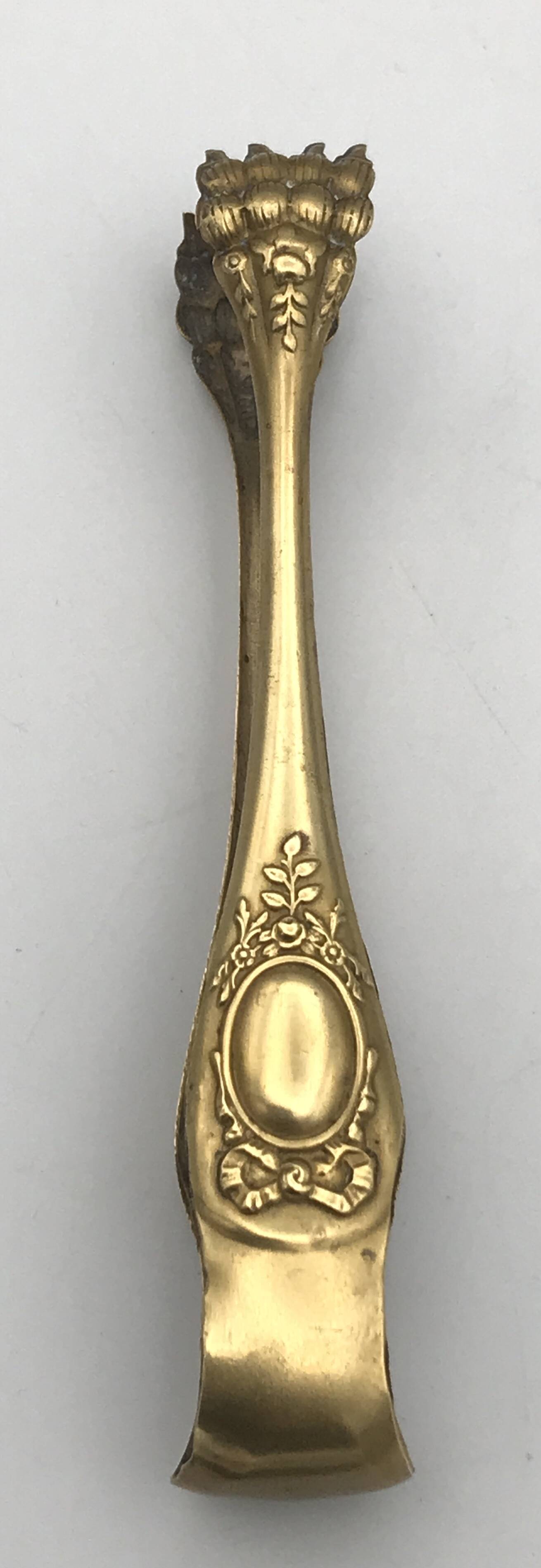 Sugar or ice cube tongs, gold star stamp with lion paw finish